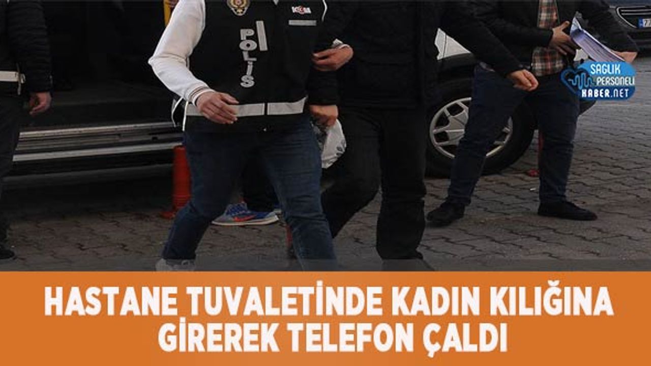 hastane-tuvaletinde-kadin-kiligina-girerek-telefon-caldi